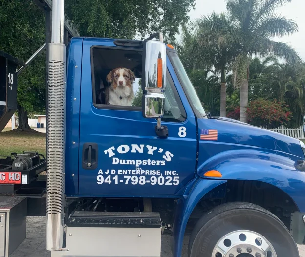 Tonys Dumpster dog on truck about page